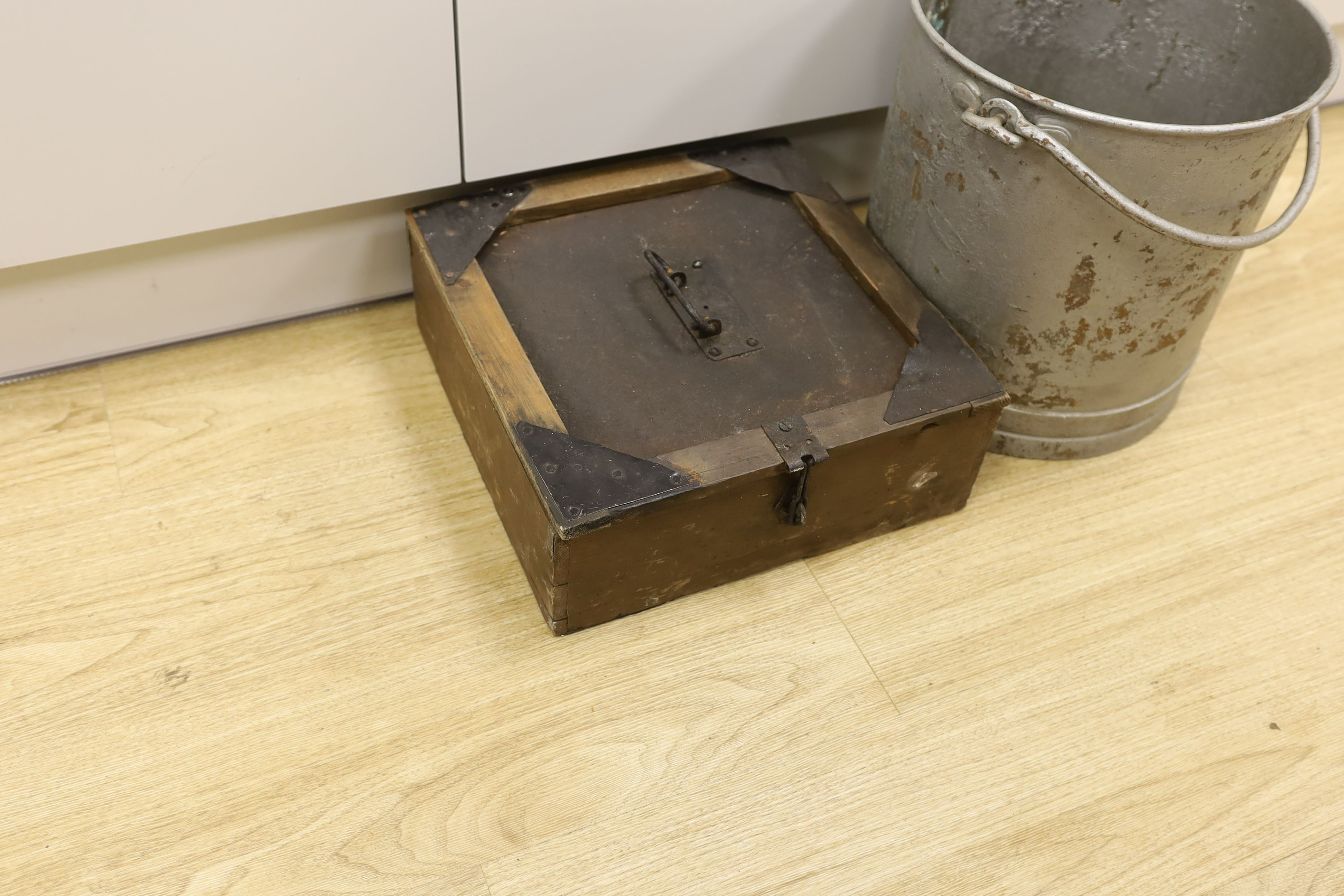 A brass mounted galvanised four gallon bucket and a case of milk sample bottles, Galvanised bucket 31 cms high.